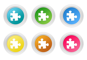 Wall Mural - set of rounded colorful buttons with puzzle symbol