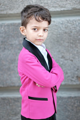 portrait of a little boy in a business style