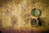 Fototapeta Mapy - old map with compass and Magnifier