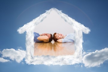 Poster - Composite image of couple lying on the floor