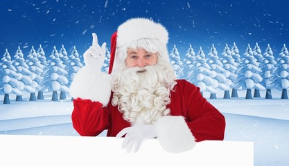 Poster - Composite image of smiling santa claus doing a gesture
