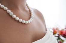 Bride Wearing Pearls Necklace