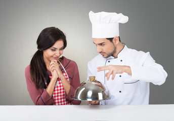 Handsome male chef сooked a surprise meal for the girl