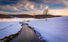 Stream Through A Snow Covered Farm Field In Rural Carroll County