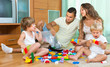 © JackF - Happy family playing in home interior