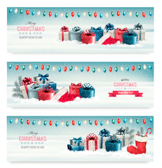 Poster - Three Christmas banners with presents. Vector.