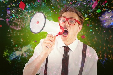 Composite image of geeky businessman shouting through megaphone