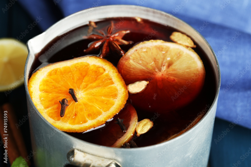 Old metal pan of tasty mulled wine