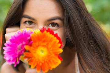 Woman with bunch of flowers