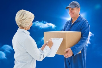 Poster - Composite image of happy delivery man with customer