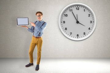 Aufkleber - Composite image of geeky businessman showing his laptop