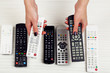 © Africa Studio - Many remote control devices in hands