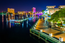 View Of The Riverwalk At Night In Tampa, Florida.