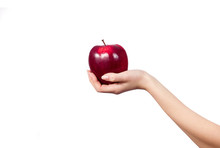 Woman's Hand Holding And Showing A  Apple On White Background