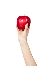 Woman's Hand Holding A Red Apple On White Background