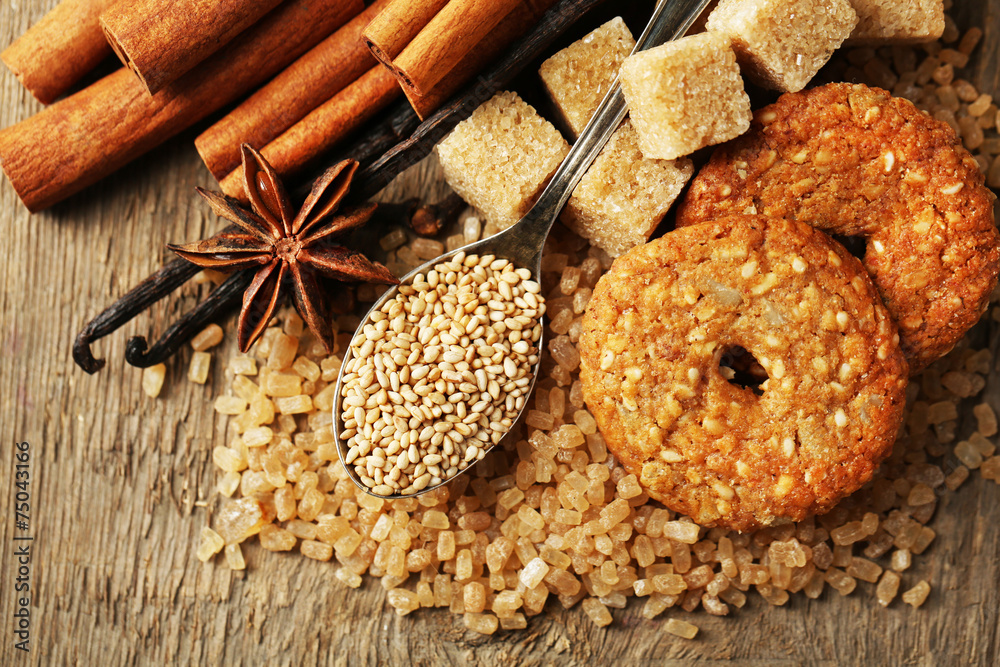 Christmas spices and baking ingredients on sackcloth background