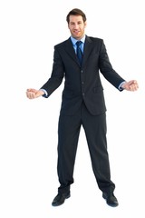 Poster - Happy businessman standing clenching his fists