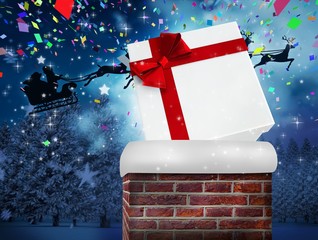 Poster - Composite image of santa flying his sleigh behind chimney