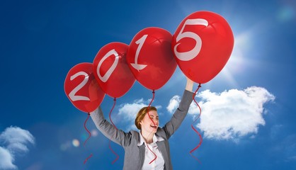 Poster - Composite image of excited redhead businesswoman cheering