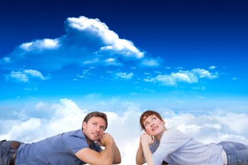 Poster - Composite image of couple lying on the floor