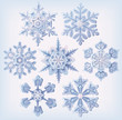 © moonkin - Set of ornate three dimensional snowflakes icons.
