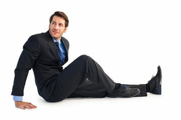 Poster - Businessman in suit sitting on floor
