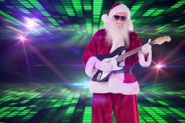 Poster - Composite image of santa claus plays guitar with sunglasses