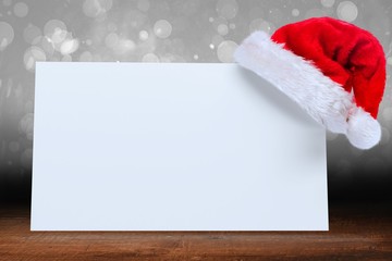 Poster - Composite image of santa hat on poster