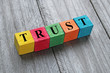 word trust on colorful wooden cubes