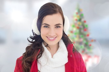Poster - Portrait of a smiling brunette with winter wear