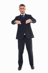 Poster - Smiling businessman in suit gesturing