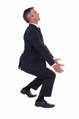 Poster - Businessman in suit carrying something