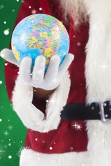 Aufkleber - Composite image of santa has a globe in his hand