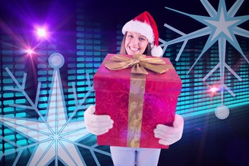 Aufkleber - Composite image of festive young woman holding a gift