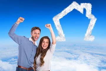 Poster - Composite image of happy young couple cheering