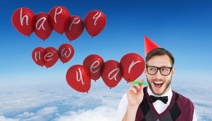 Poster - Composite image of geeky hipster in party hat with horn