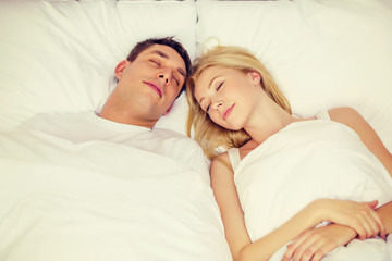 Canvas Print - happy couple sleeping in bed