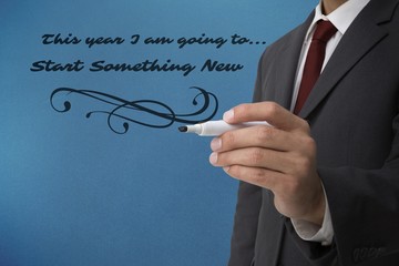 Poster - Composite image of classy businessman holding a marker