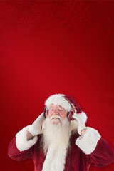 Poster - Composite image of santa claus enjoys some music