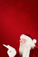 Poster - Composite image of santa claus blowing