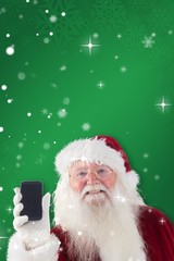 Aufkleber - Composite image of santa claus shows a smartphone