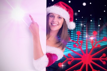 Poster - Composite image of pretty girl in santa costume showing card