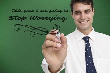 Poster - Composite image of smiling businessman holding marker