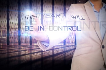 Poster - Composite image of businesswoman pointing