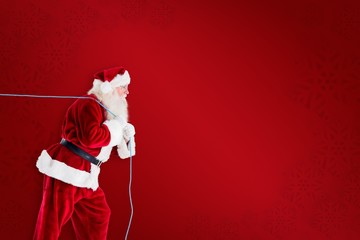 Poster - Composite image of santa claus pulling rope