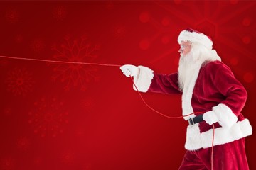 Aufkleber - Composite image of santa pulls something with a rope
