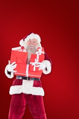Poster - Composite image of santa carries a few presents