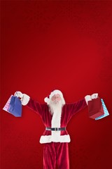 Aufkleber - Composite image of santa holds some bags for chistmas