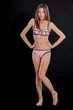 © imagesbykenny - Chinese woman in underwear on black background