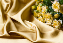 Yellow Roses On Silk Background